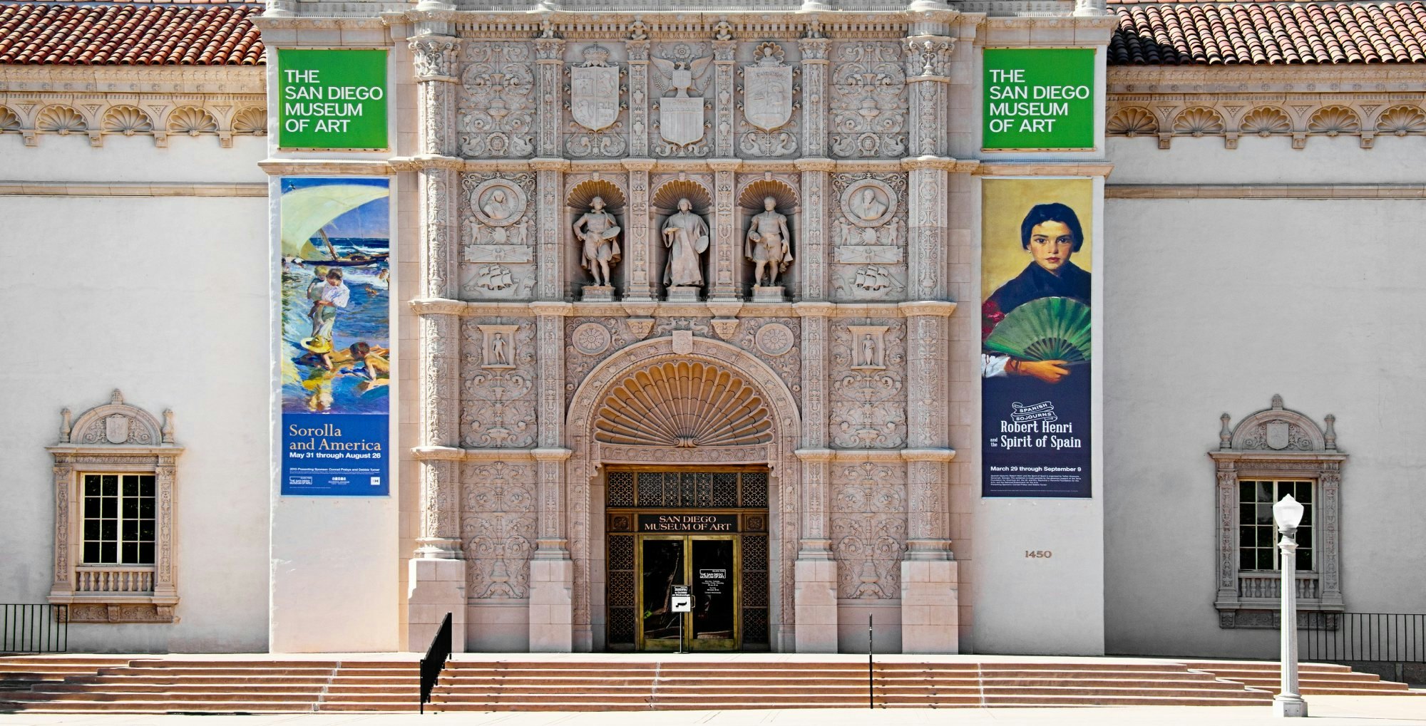 San Diego, USA- June 11, 2014: The San Diego Museum of Art is a fine arts museum located in Balboa Park in San Diego. The museum building was designed in a plateresque style to harmonize with existing structures from the Panama–California Exposition of 1915. The dominant feature of the facade is a heavily ornamented door inspired by a doorway at the University of Salamanca.