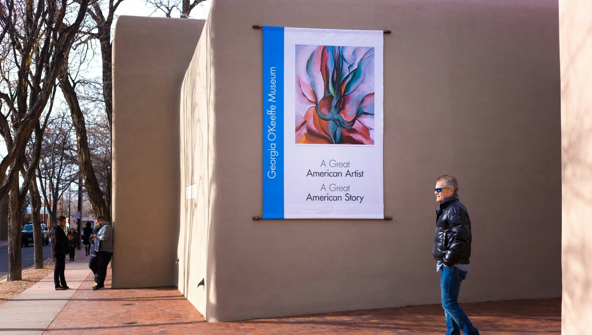Santa Fe, NM: People outside the Georgia O’Keeffe Museum in downtown Santa Fe, NM on a winter day.