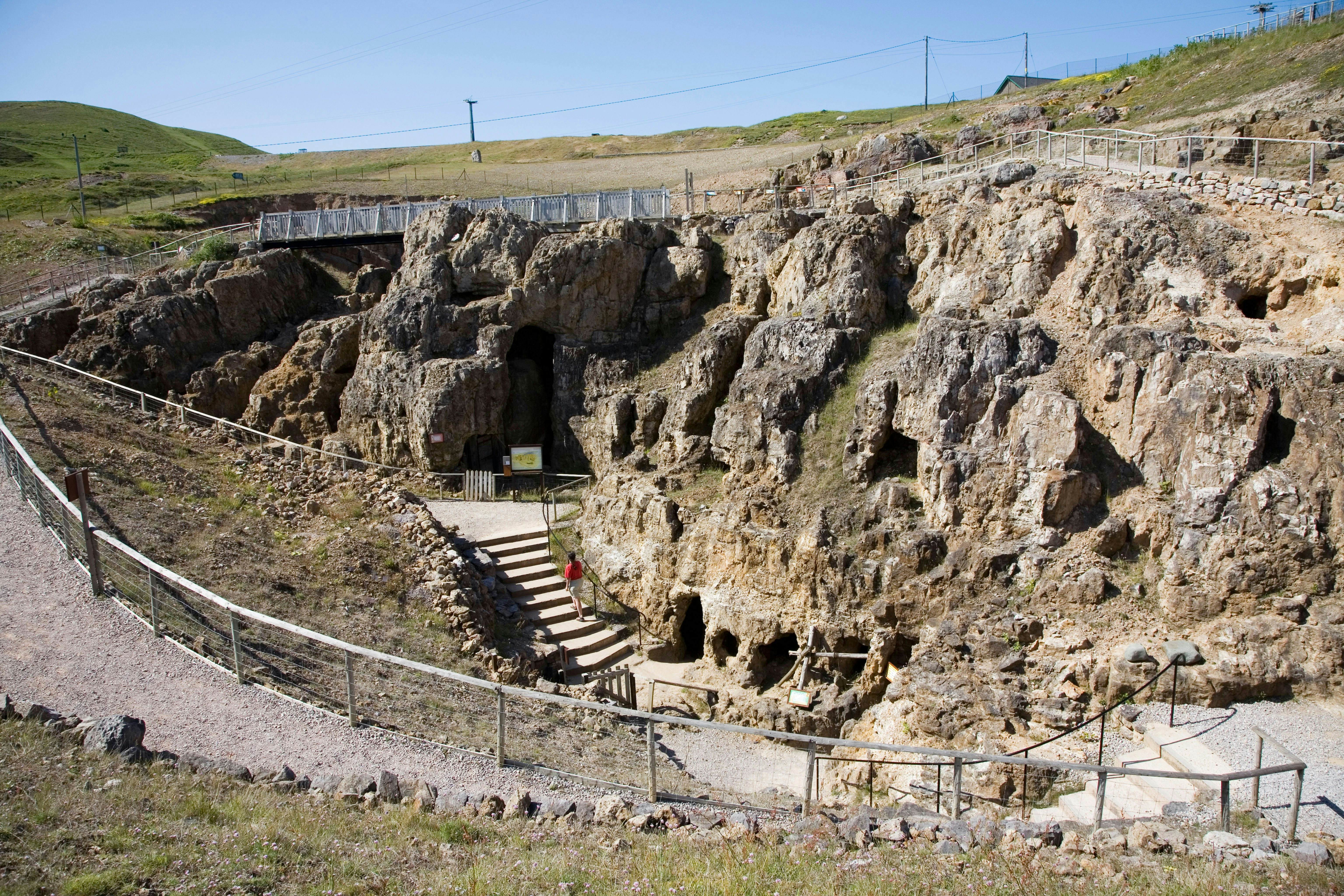 ATPAX7 Woman visitor at the Great Orme Ancient Copper Mines excavation Llandudno Wales UK

Great Orme Bronze Age Mines
