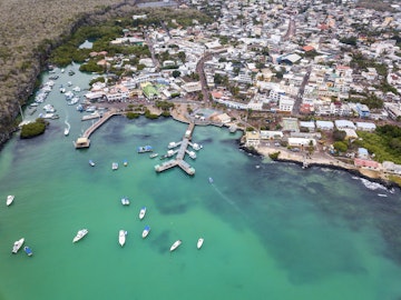 Aerial view of  the harbor and main pier Puerto Ayora, Santa Cruz Island, Galapagos. Puerto Ayora is the most populous town in the Galapagos Islands, the population is about 15000 people.