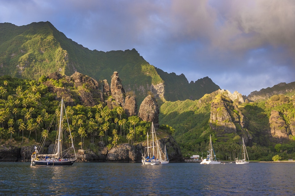 yachts anchoring in the Bay of virgins on Fatu Hiva Island, Marquesas Archipelago