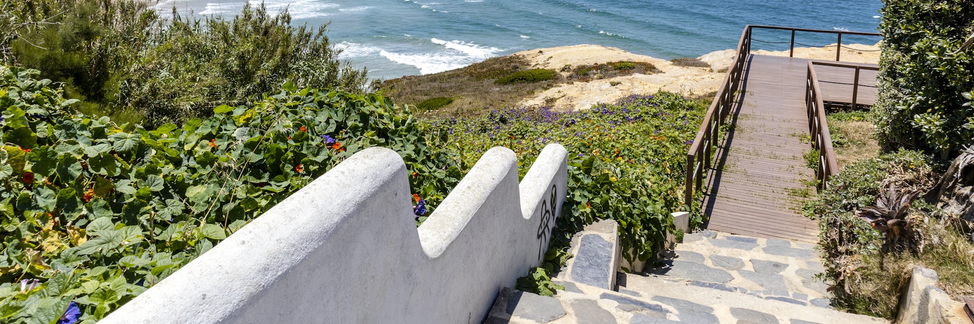 Wooden walkways by the Atlantic Ocean in Zambujeira Do Mar, Vicentina Coast Natural Park, Alentejo, Portugal