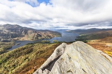 Looking westwards towards Loch Katrine from the summit of Ben A'an in The Trossachs of Scotland. Ben A'an is a popular rocky summit for a half day hike with superb views over lochs and mountains.More Scottish themes from this lightbox: