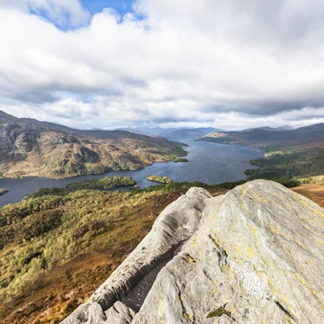Looking westwards towards Loch Katrine from the summit of Ben A'an in The Trossachs of Scotland. Ben A'an is a popular rocky summit for a half day hike with superb views over lochs and mountains.More Scottish themes from this lightbox: