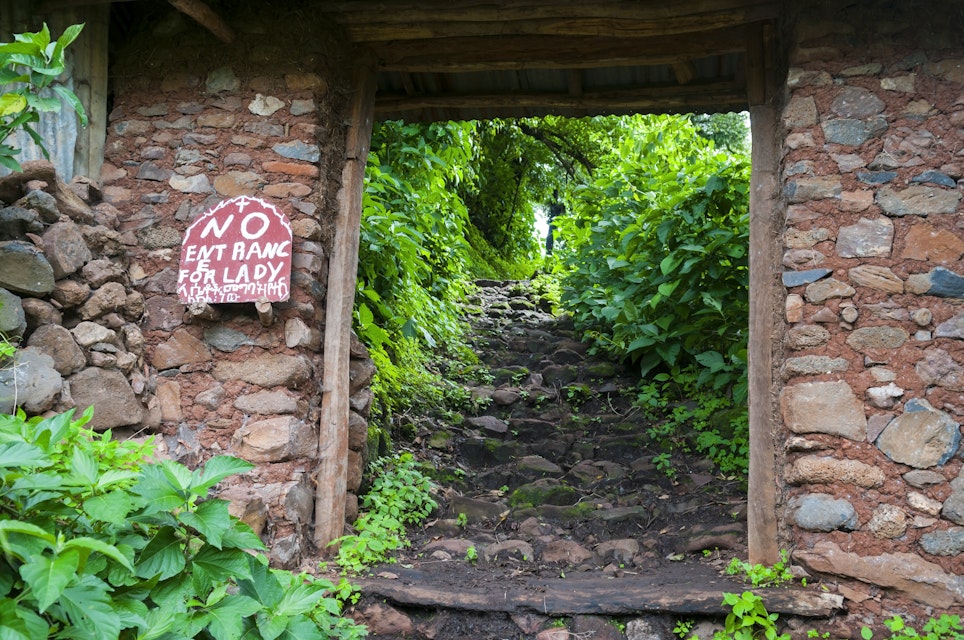 A sign prohibiting the entrance of women at the entrance to the Kibran Gabriel Island Monastery on Lake Tana in Ethiopia