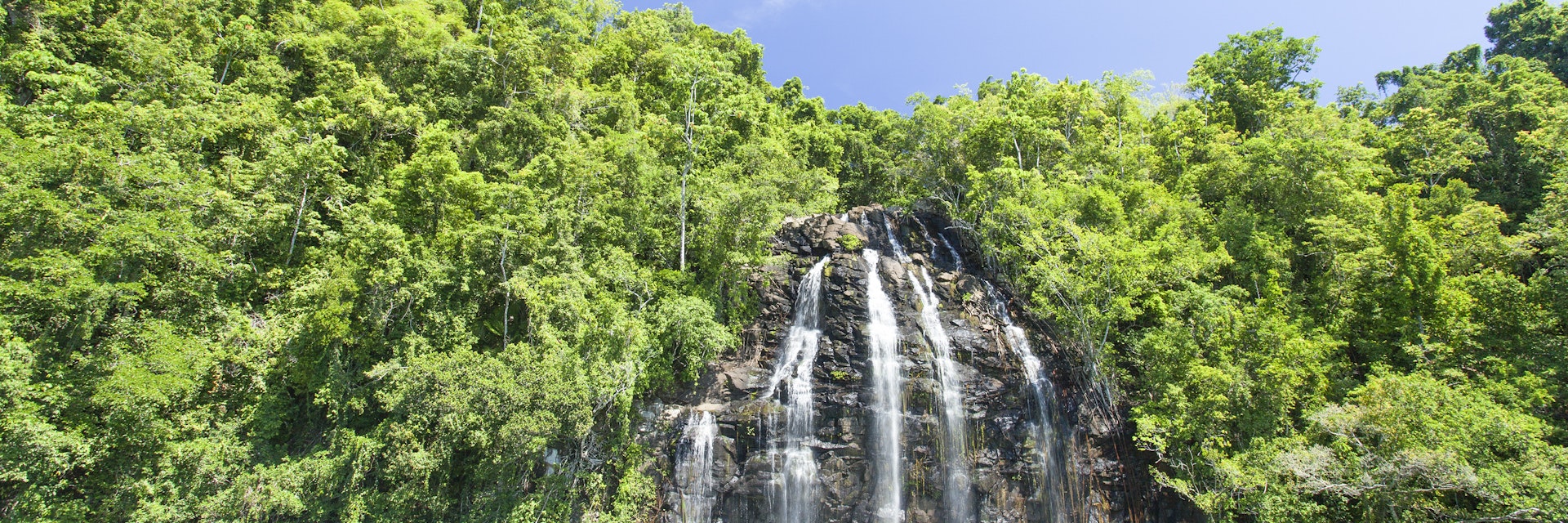 Breathaking view of Kahatola Waterfall in Ternate. It is in the Maluku Islands (Moluccas) of eastern Indonesia. It was the center of the powerful former Sultanate of Ternate. It is off the west coast of the larger island of Halmahera.