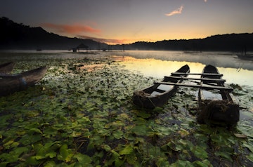 morning scenery at tamblingan lake, bali, indonesia
