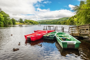 Rowing boats on Loch Faskally at Pitlochry, Scotland.