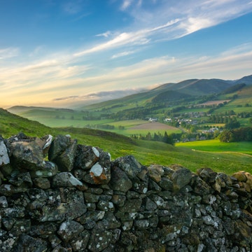 Landscape Of The Beautiful Rolling Scottish Borders Countryside At Sunset