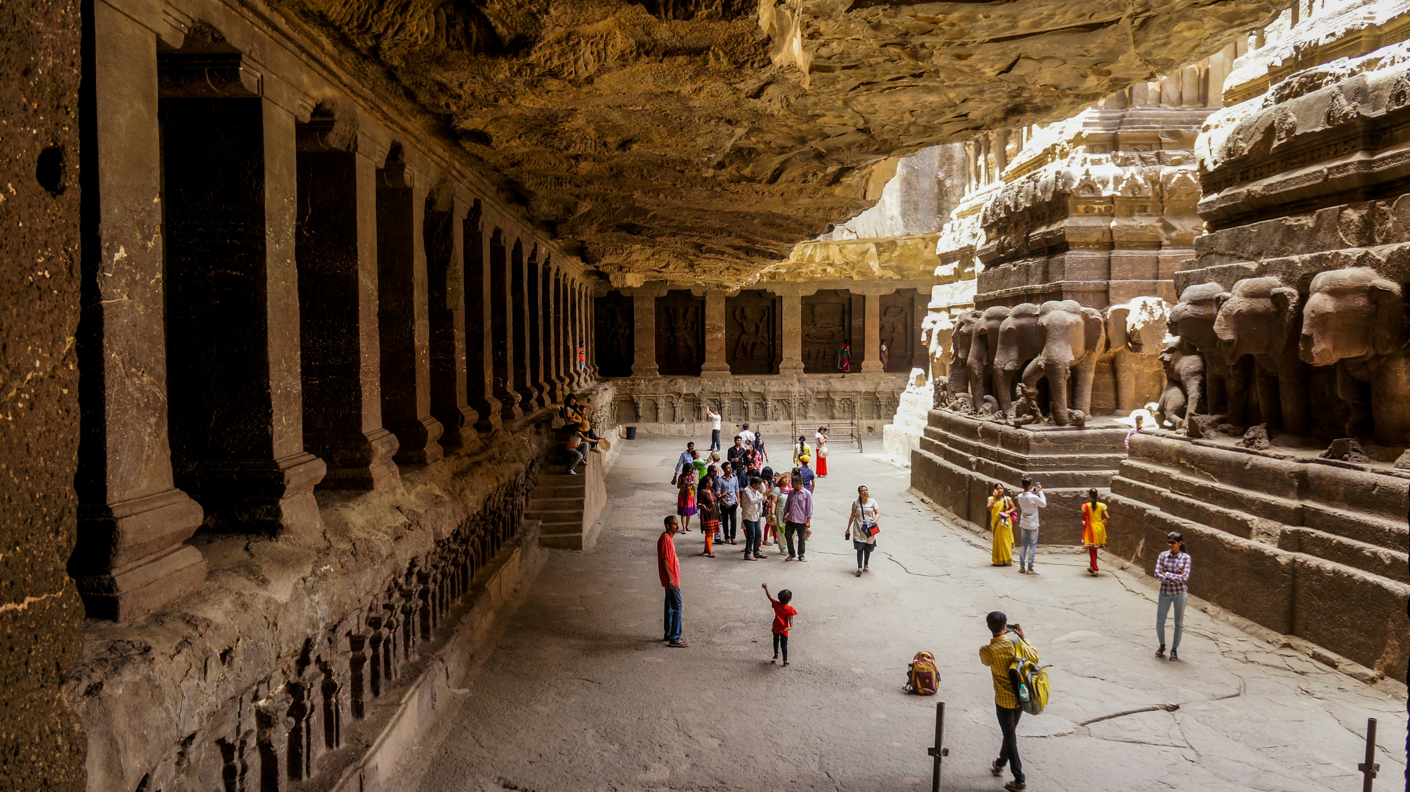 May 2017: Visitors explore a temple inside the Ellora Caves.