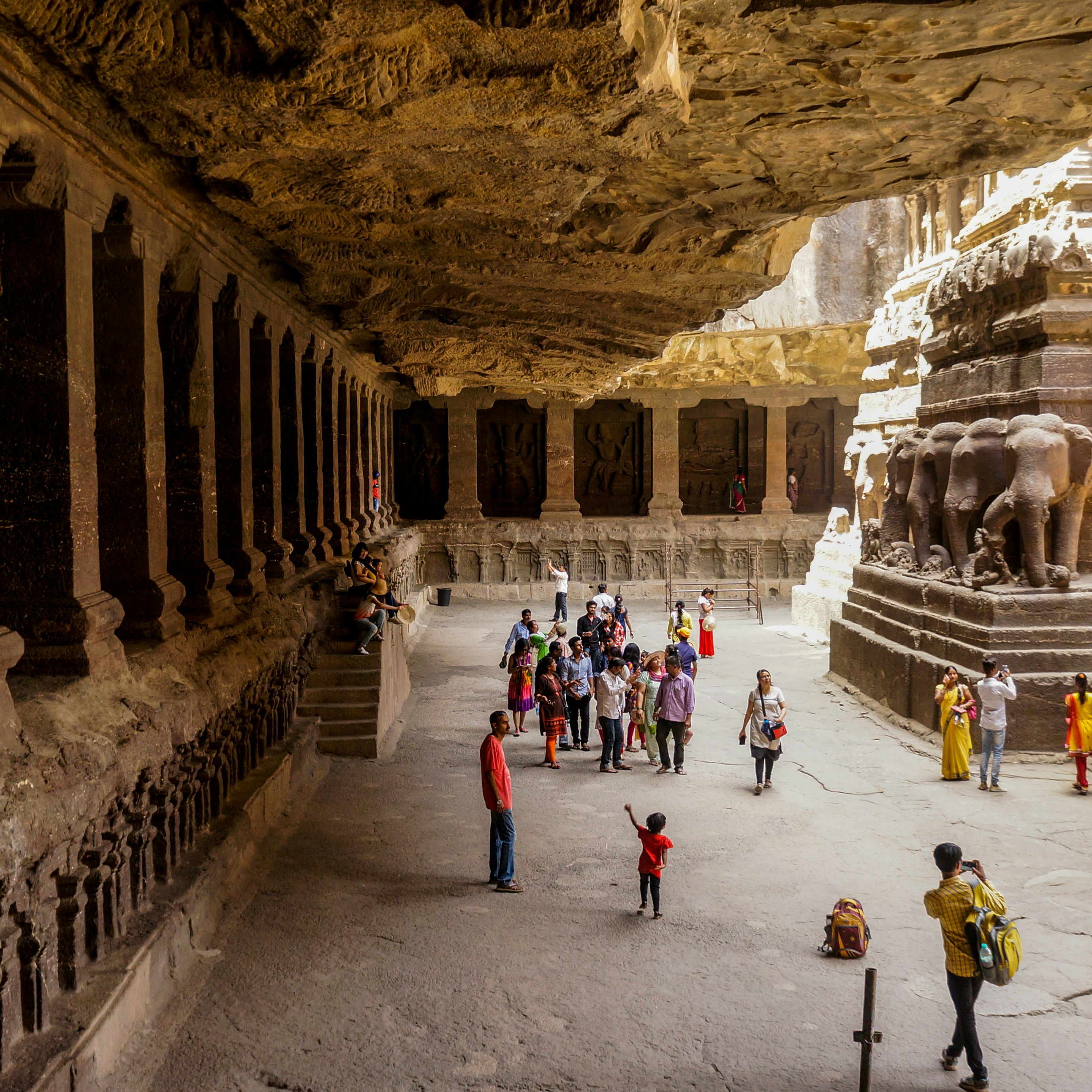 May 2017: Visitors explore a temple inside the Ellora Caves.