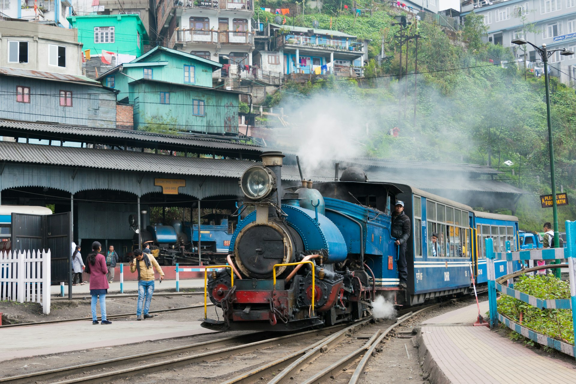 The toy train rolls into Darjeeling Railway Station