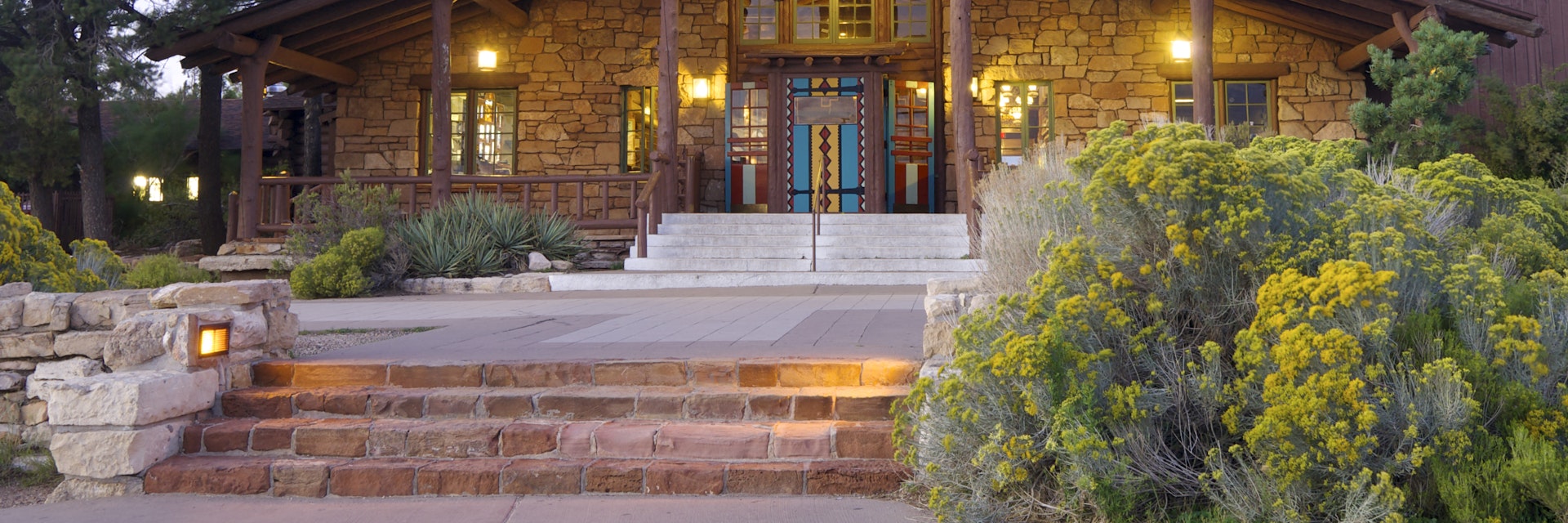 GRAND CANYON, USA - AUGUST 30: Lodge on August 30, 2007 in Grand Canyon: Entrance to the Bright Angel Lodge. Designed in 1935, the Lodge is a neuralgic point of activity in the South Rim.