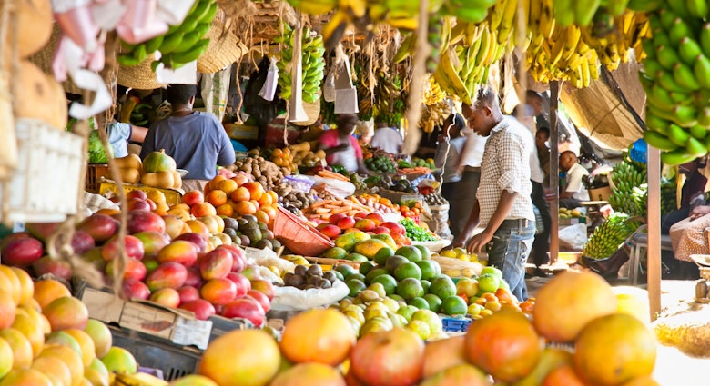 NAIROBI, KENYA- FEBRUARY 6, 2014: Ripe fruits stacked at a local fruit and vegetable market on February 6, 2014. Nairobi, Kenya.