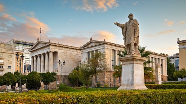 September 25, 2015: Statue at the National Library of Greece in Panepistimio.
