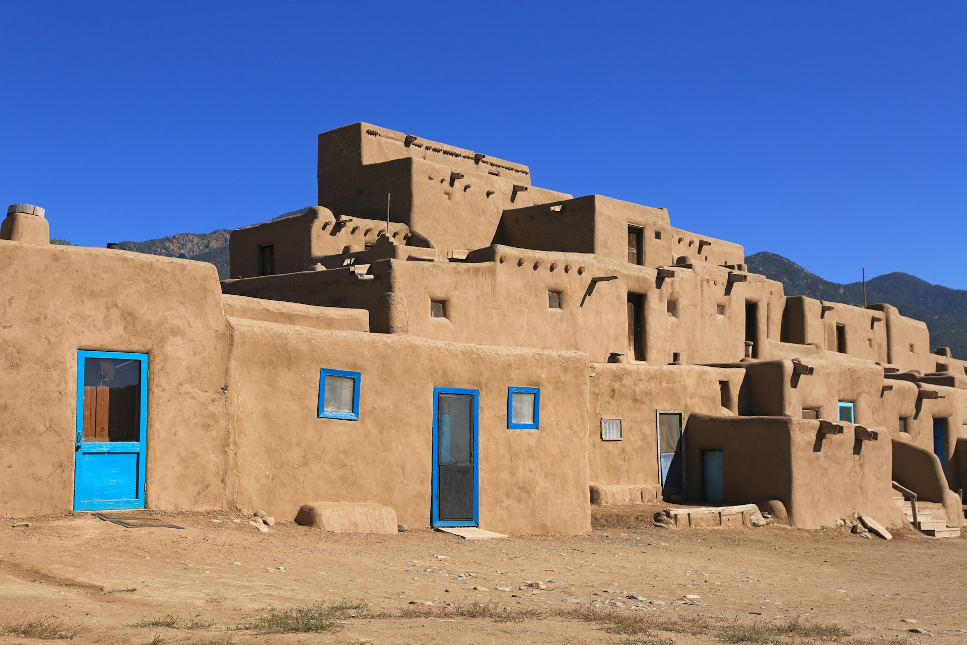 The Taos Pueblo in New Mexico with adobe structures stacked atop each other