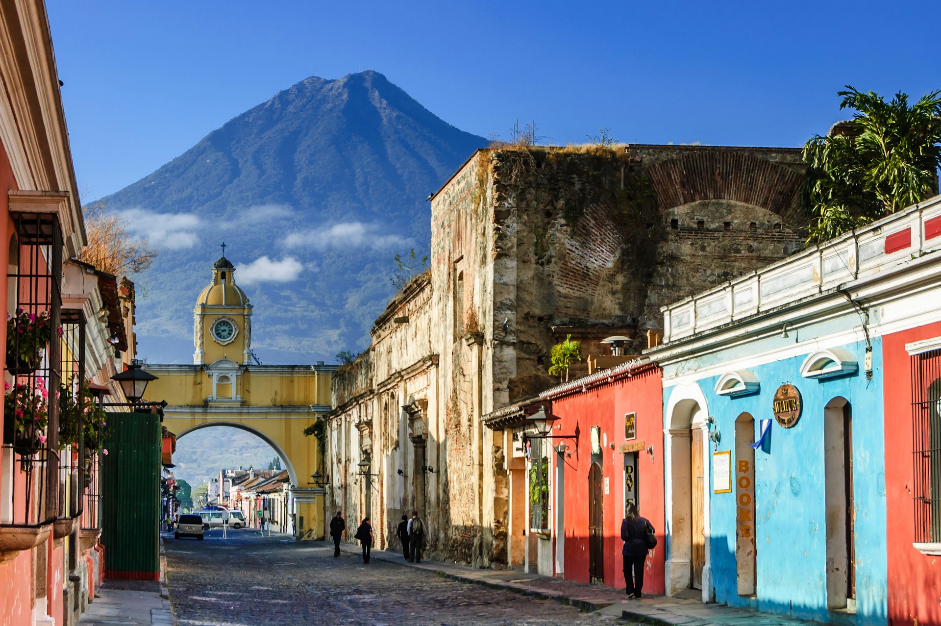 The Agua volcano rises above the cobbled streets of Antigua