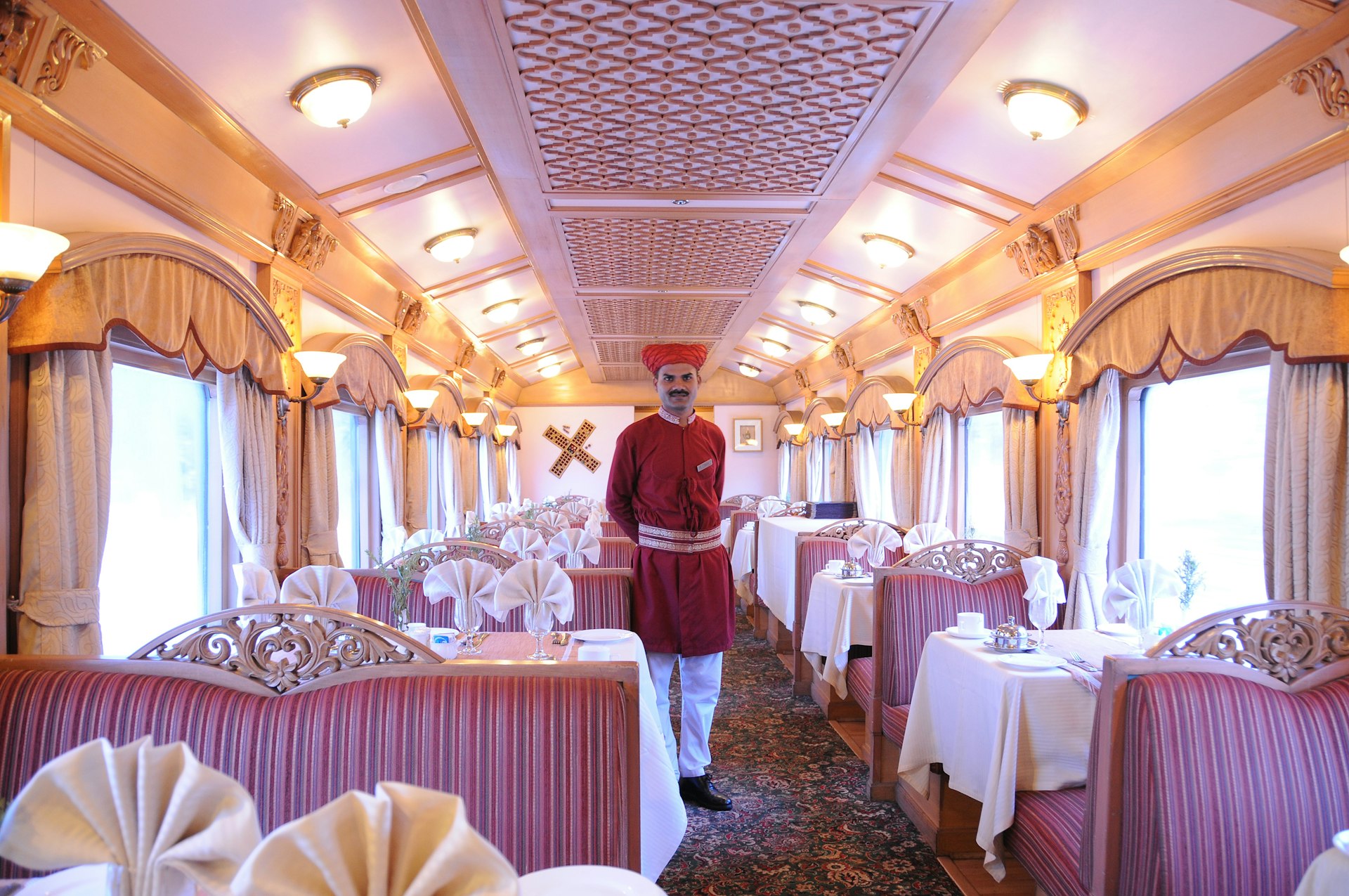 The lavish dining car onboard the Deccan Odyssey train from Delhi to Mumbai 