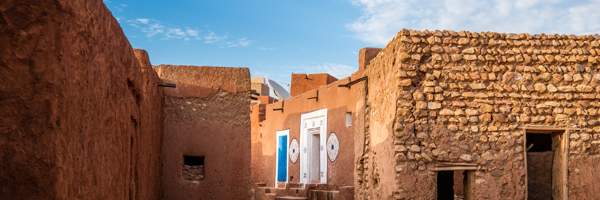 Famous ancient arabic door paintings at medieval bricked house in World Heritage Site Walata, Mauritania; Shutterstock ID 1096636094; your: Erin Lenczycki; gl: 65050; netsuite: Online Editorial; full: Destination