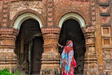 Woman at Puthia Temple Complex, Rajshahi Division, Bangladesh; Shutterstock ID 1821806279; your: Erin Lenczycki; gl: 65050; netsuite: Online Editorial; full: Destination