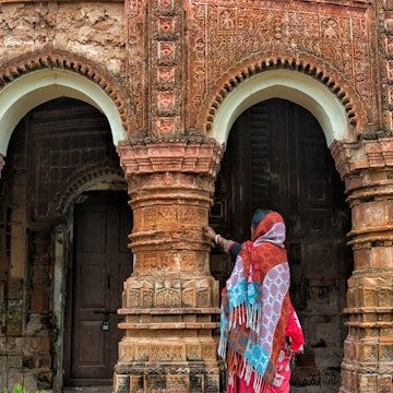 Woman at Puthia Temple Complex, Rajshahi Division, Bangladesh; Shutterstock ID 1821806279; your: Erin Lenczycki; gl: 65050; netsuite: Online Editorial; full: Destination