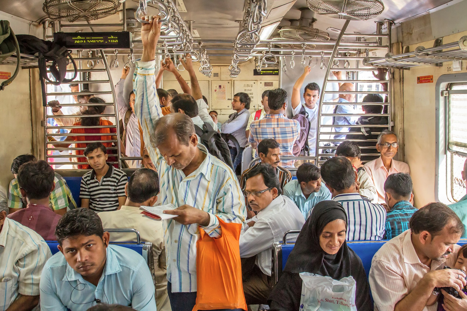 Passengers inside an Indian Railway local train in Mumbai, India