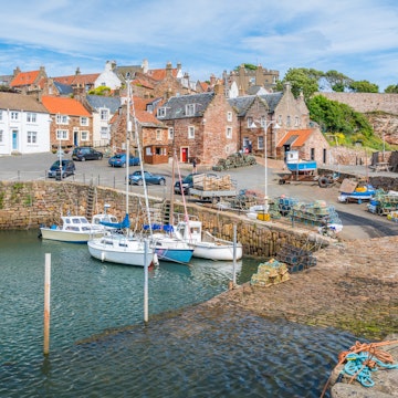 Crail harbour in a sunny summer morning, small fishermen village in Fife, Scotland.