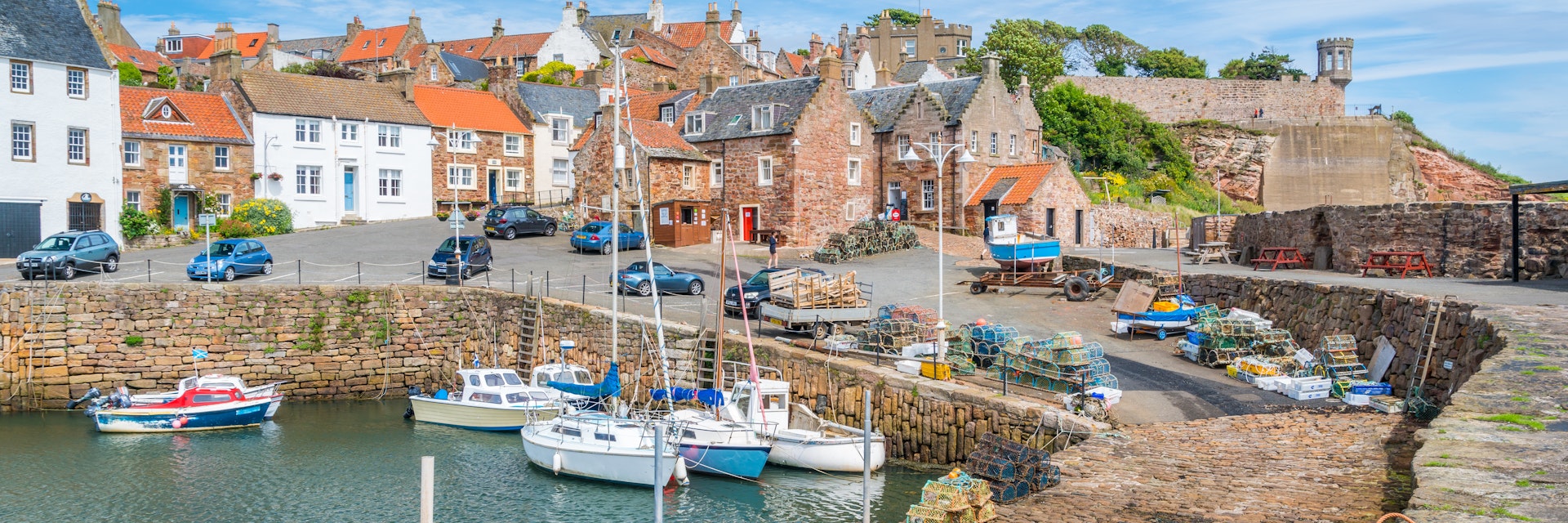 Crail harbour in a sunny summer morning, small fishermen village in Fife, Scotland.