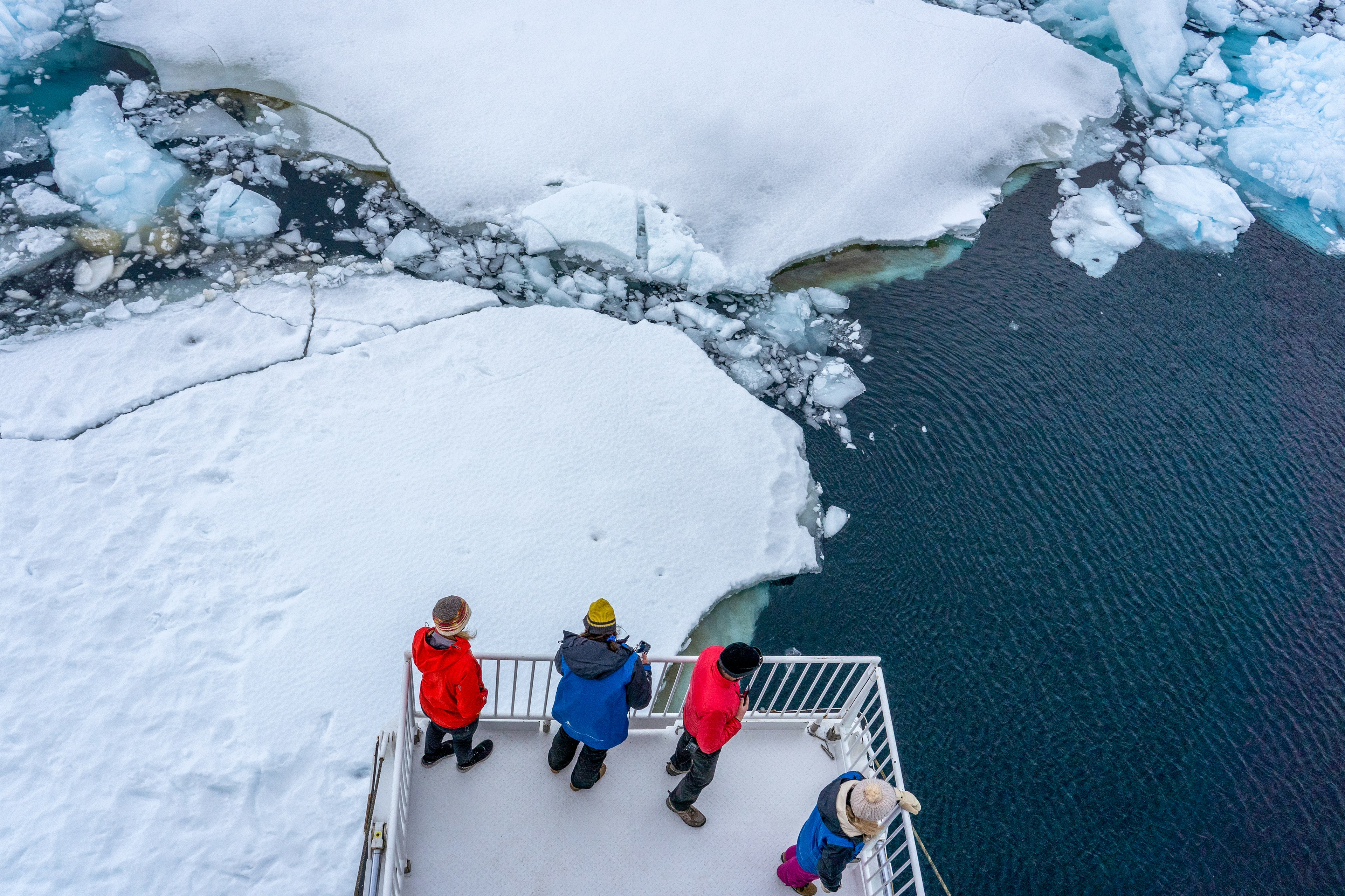 Overhead view of boat passing through the Lemaire Channel in Antartica.