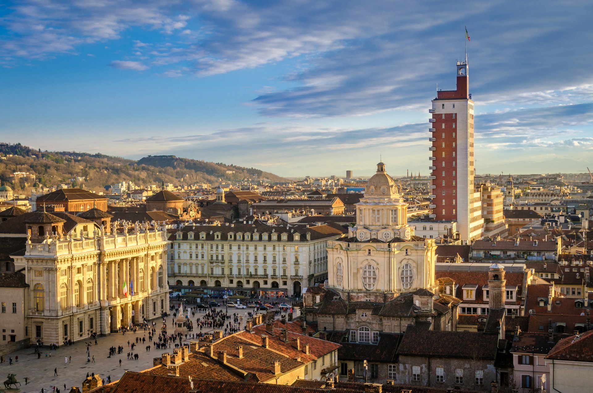 An elevated view of Piazza Castello in Turin at sunset