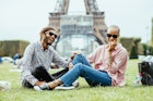 Image of multiracial people in Paris near Eiffel tower, image taken in 7th district of Paris