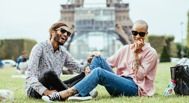 Image of multiracial people in Paris near Eiffel tower, image taken in 7th district of Paris