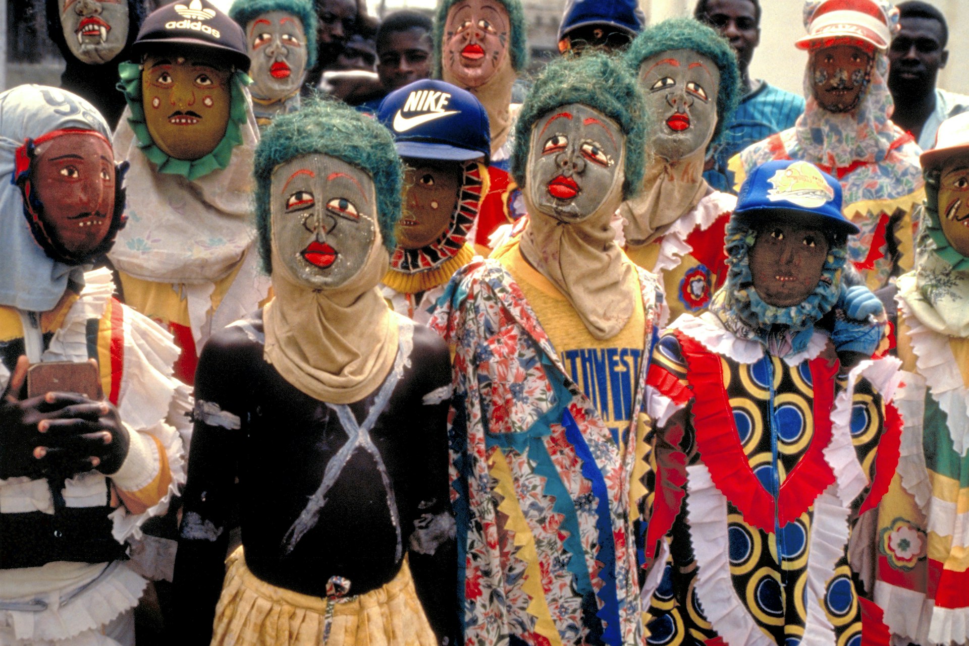 Festival participants wear masks for a procession during the Fetu Afahye festival, Cape Coast Ghana