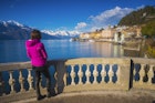 Woman admiring the village of Bellagio during a winter afternoon.