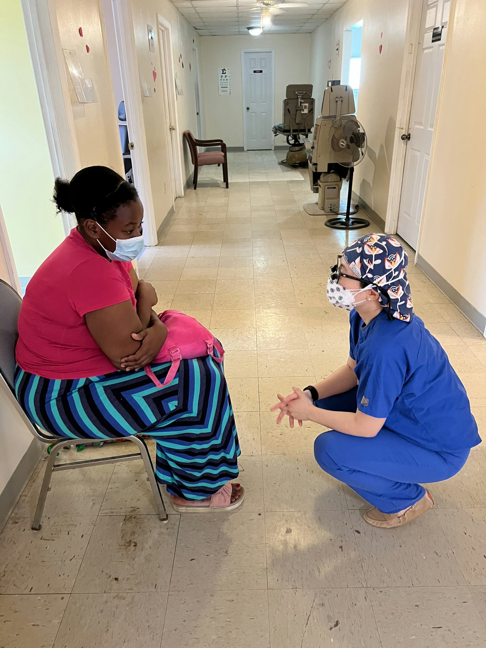 Dr. Jenny Yu providing medical care to a local Honduras patient