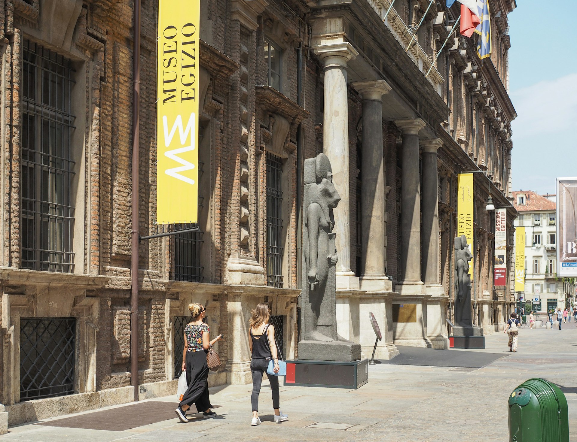 Two women walk up to the main entrance of the Museo Egizio in Turin