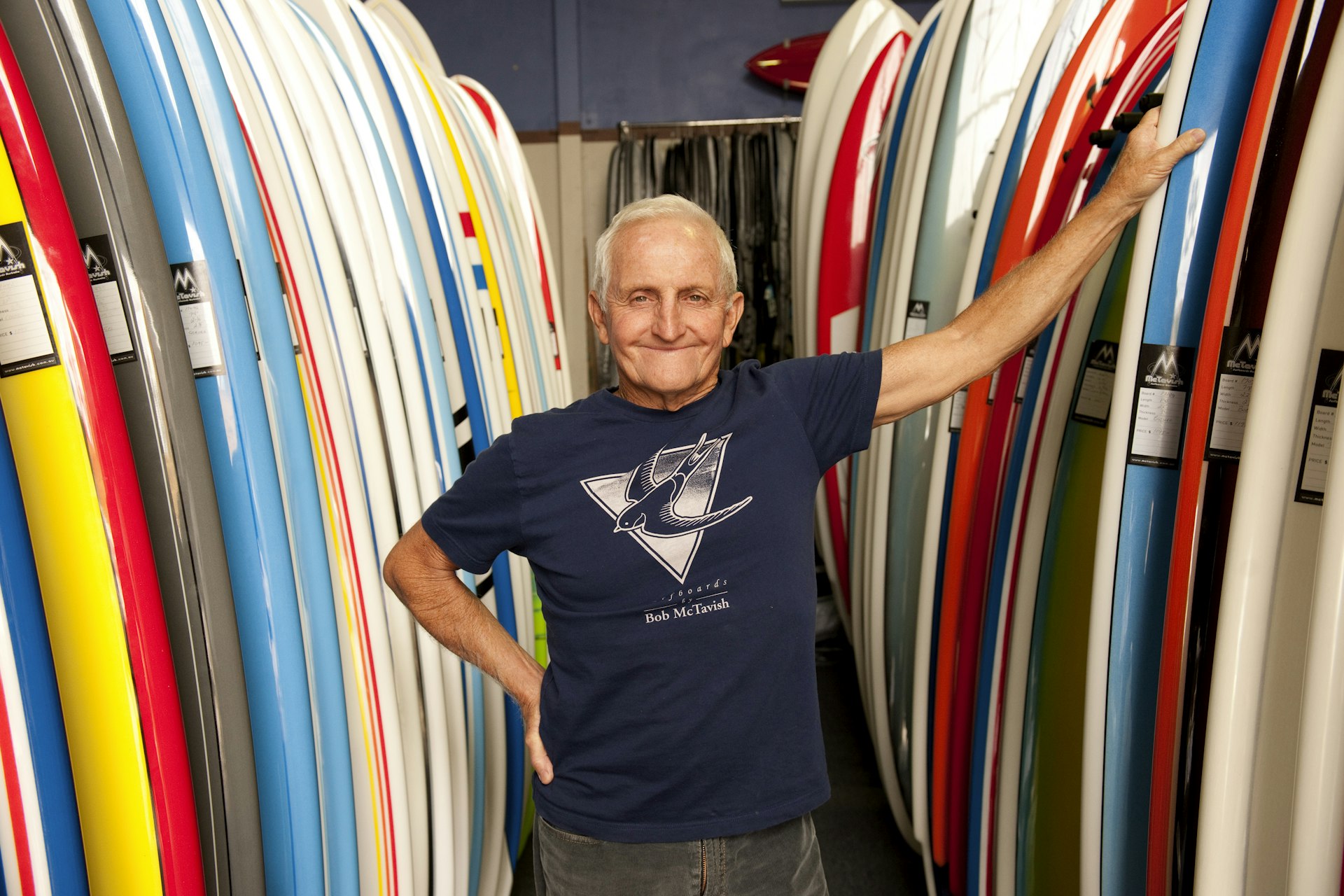 Portrait of local surf legend at his McTavish surfboard shop