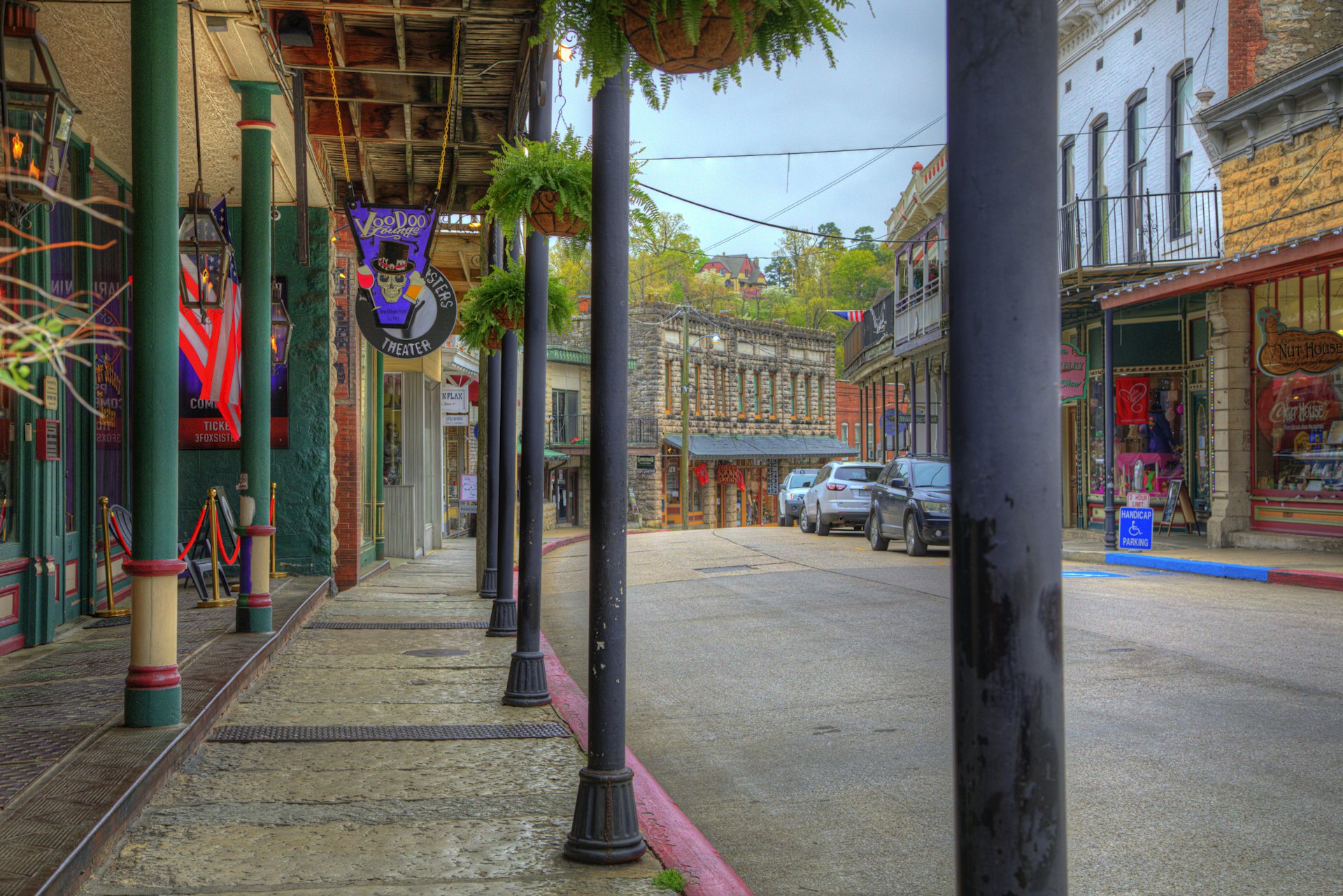 The colorful shopfronts and porches of Spring Street in Eureka Springs, Arkansas