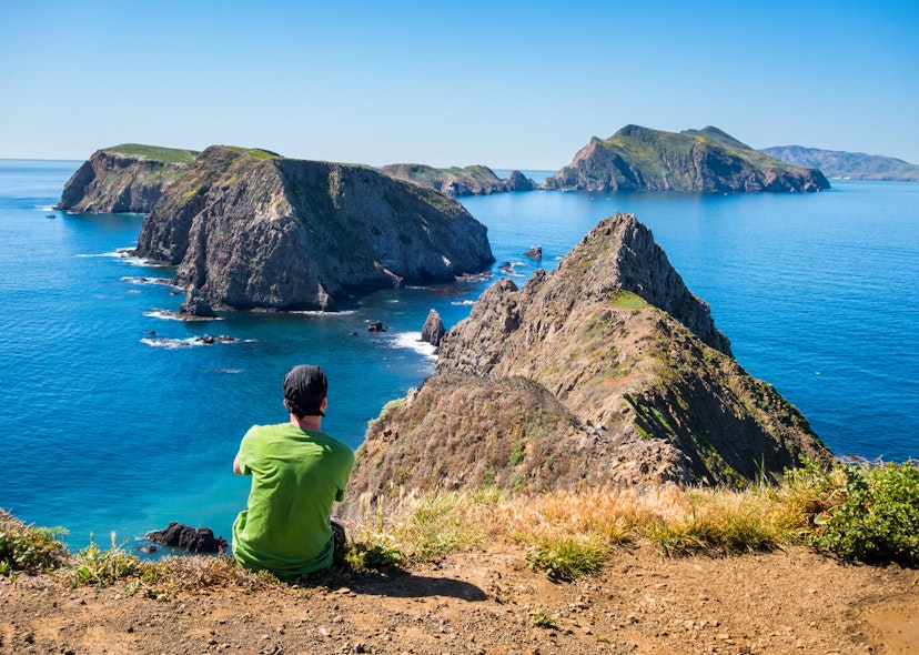 Traveller resting at breathtaking landscape on Anacapa Island. Anacapa Island is one of the five islands which form the Channel Islands National Park, near Los Angeles, California, USA