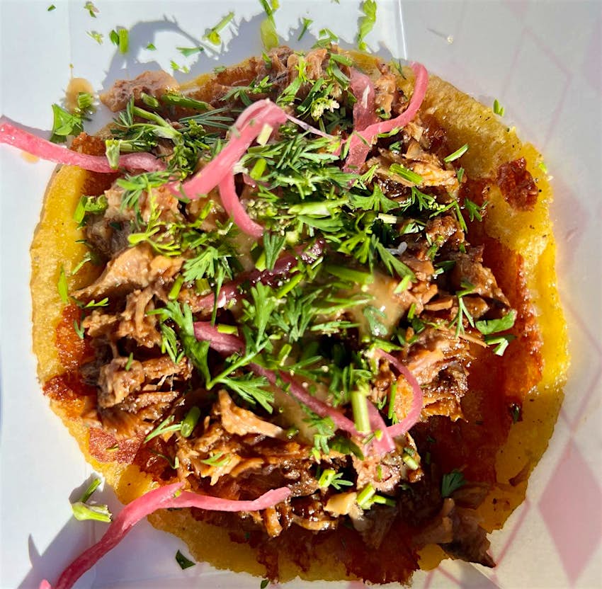 Birria taco, the Goat Mafia, Los Angeles An overhead shot of the Goat Mafia's birria taco with cilantro and pickled onions