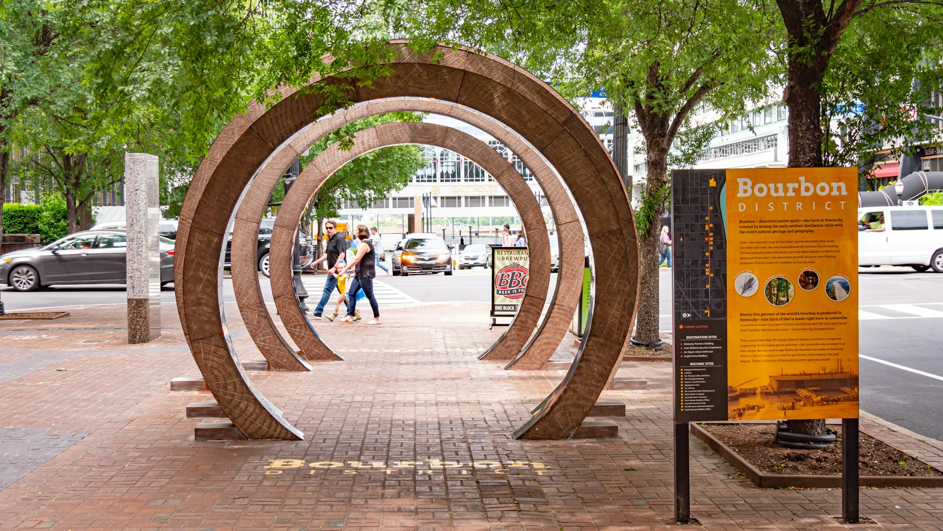 A large whiskey barrel cut into sections to form a piece of walk-through street art in Louisville, Kentucky