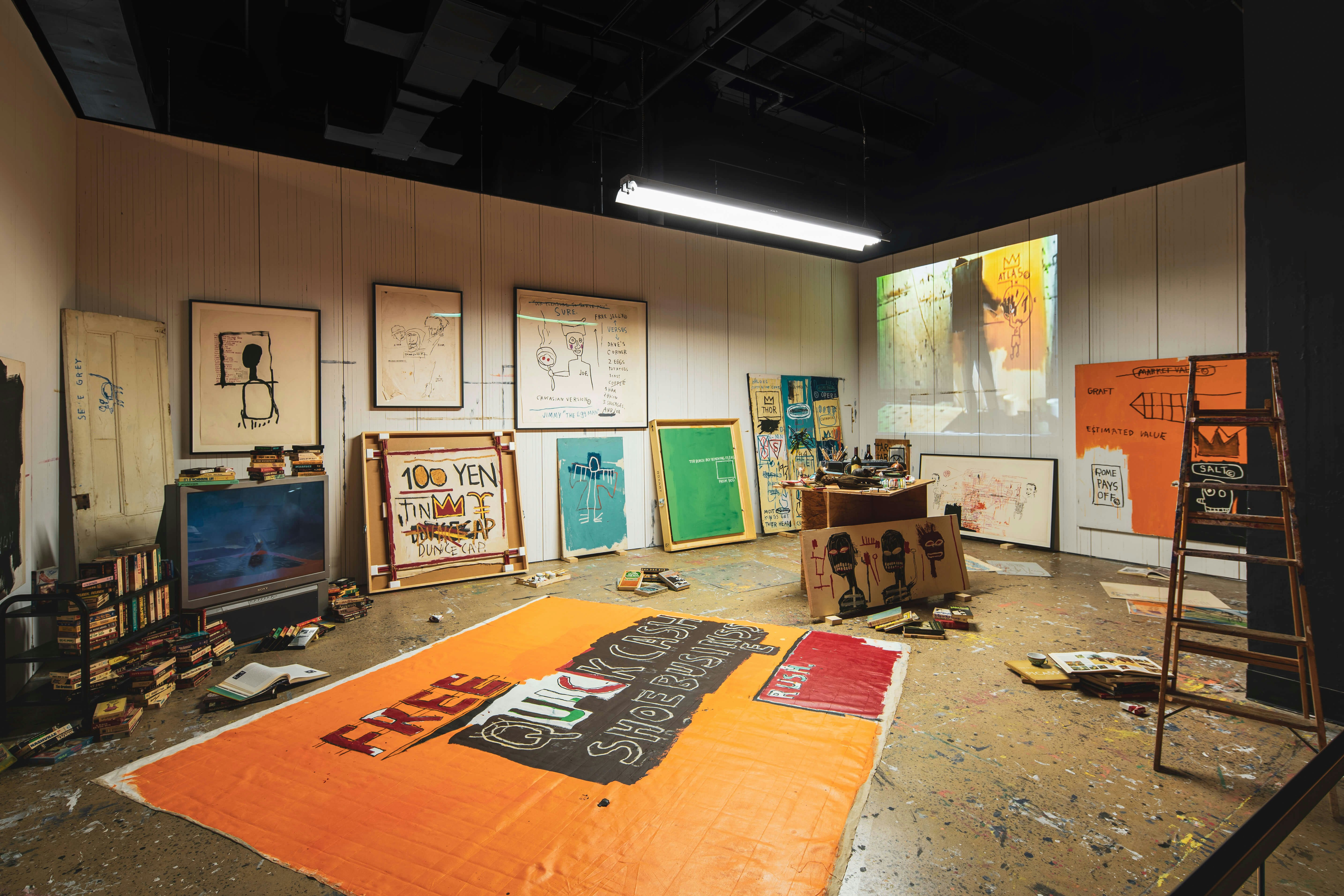 Installation view of the Jean-Michel Basquiat: King Pleasure exhibit in the Starrett-Lehigh Building in West Chelsea, New York