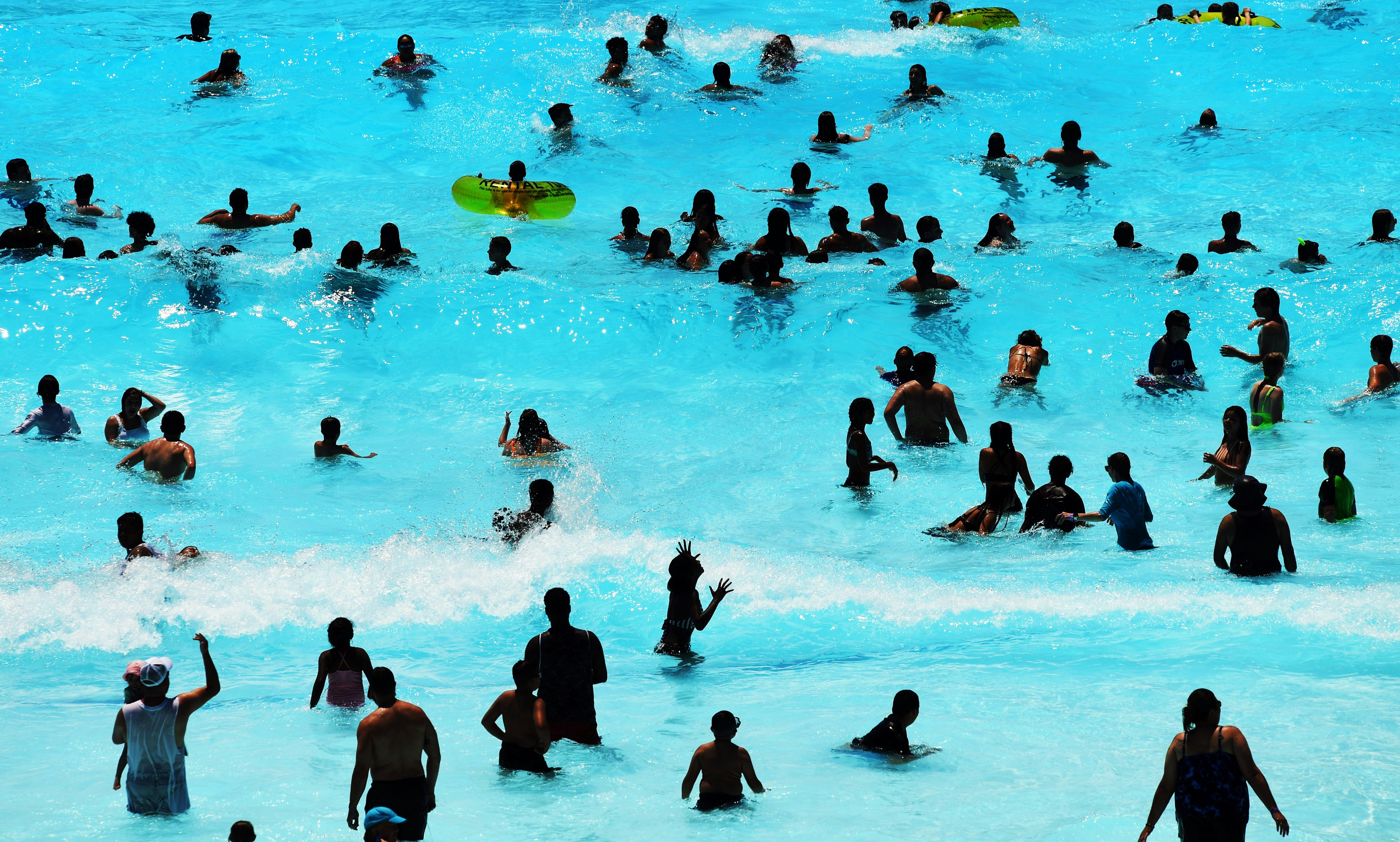 FEDERAL HEIGHTS, COLORADO - JUNE 14: Visitors at Water World cool off from temperatures in the high 90s on June 14, 2021 in Federal Heights, Colorado. Due to the COVID-19 pandemic the water park was closed last summer. The park is now open to guest with no restrictions and has two new attractions for visitor to ride. (Photo by RJ Sangosti/MediaNews Group/The Denver Post via Getty Images)