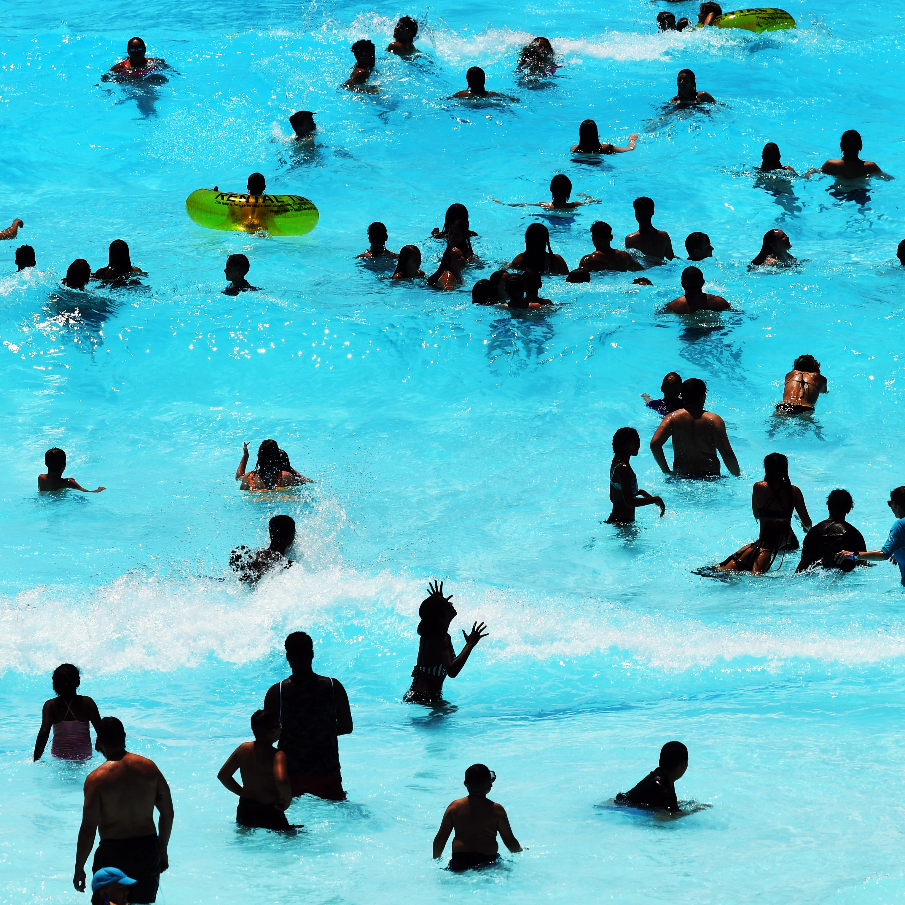 FEDERAL HEIGHTS, COLORADO - JUNE 14: Visitors at Water World cool off from temperatures in the high 90s on June 14, 2021 in Federal Heights, Colorado. Due to the COVID-19 pandemic the water park was closed last summer. The park is now open to guest with no restrictions and has two new attractions for visitor to ride. (Photo by RJ Sangosti/MediaNews Group/The Denver Post via Getty Images)