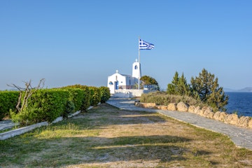 A  white small orthodox chapel dedicated to St.Nikolaos. Rafina,Greece