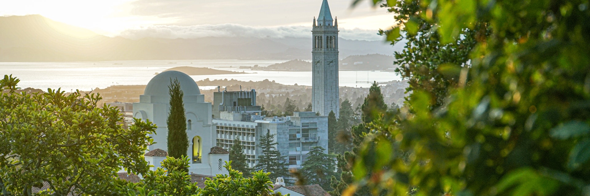Beautiful view of Berkeley Skyline, including Sather Tower, or Campanile, and International House, with San Francisco Bay in the background.