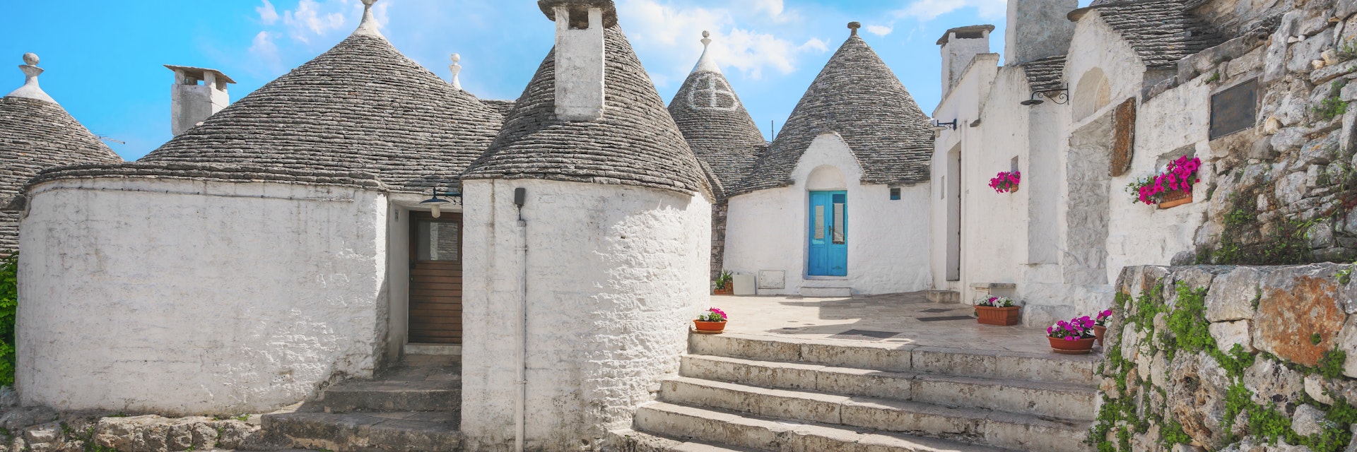 Trulli of Alberobello typical houses, street view. Apulia, Italy. Europe.