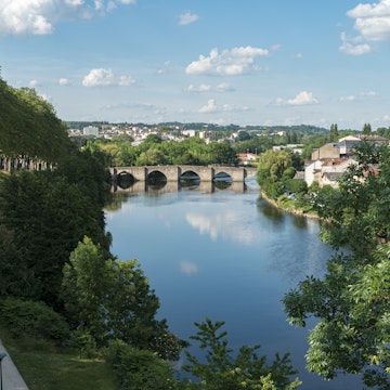Saint Etienne Bridge in Limoges City with clouds reflection