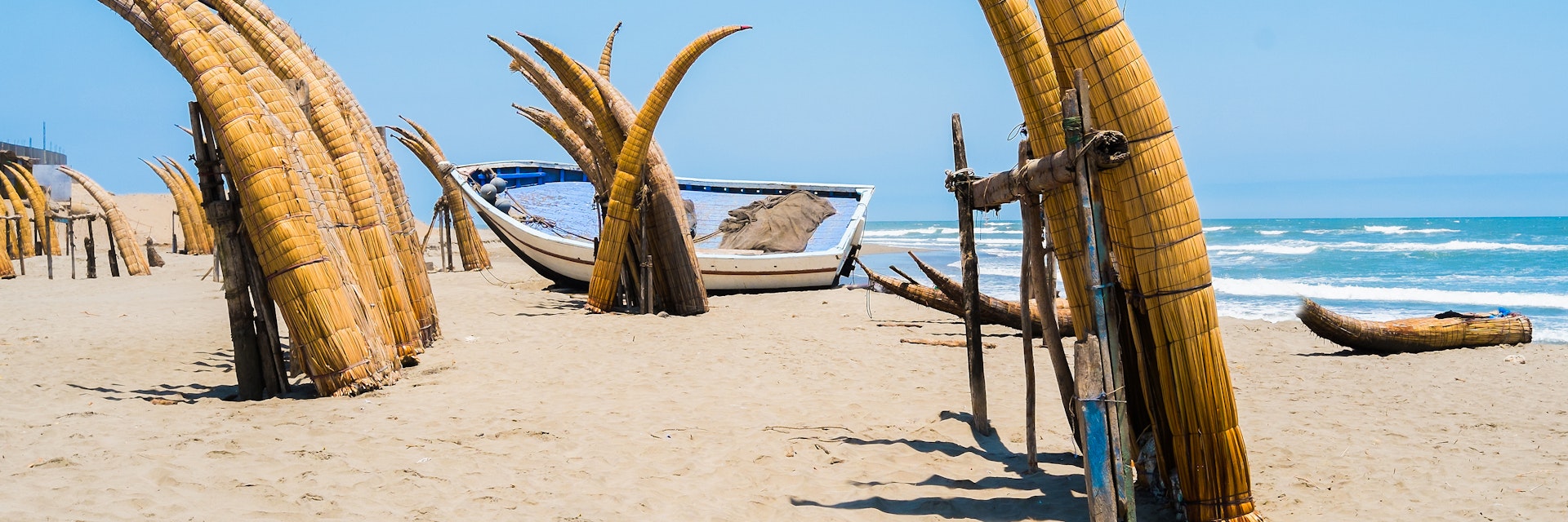 Typical fishing boat Caballitos on the beach of Pimentel, Chiclayo, Peru