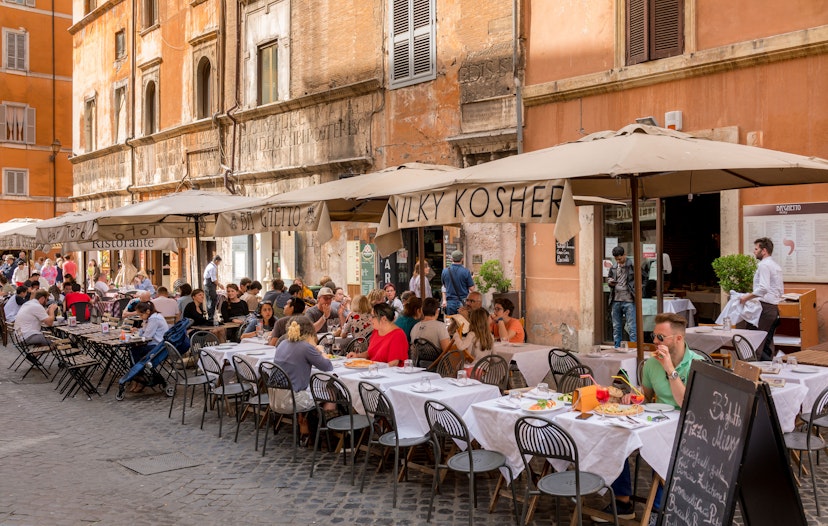 APRIL 30, 2018: Diners outside a restaurant in the Jewish Ghetto quarter of Rome.